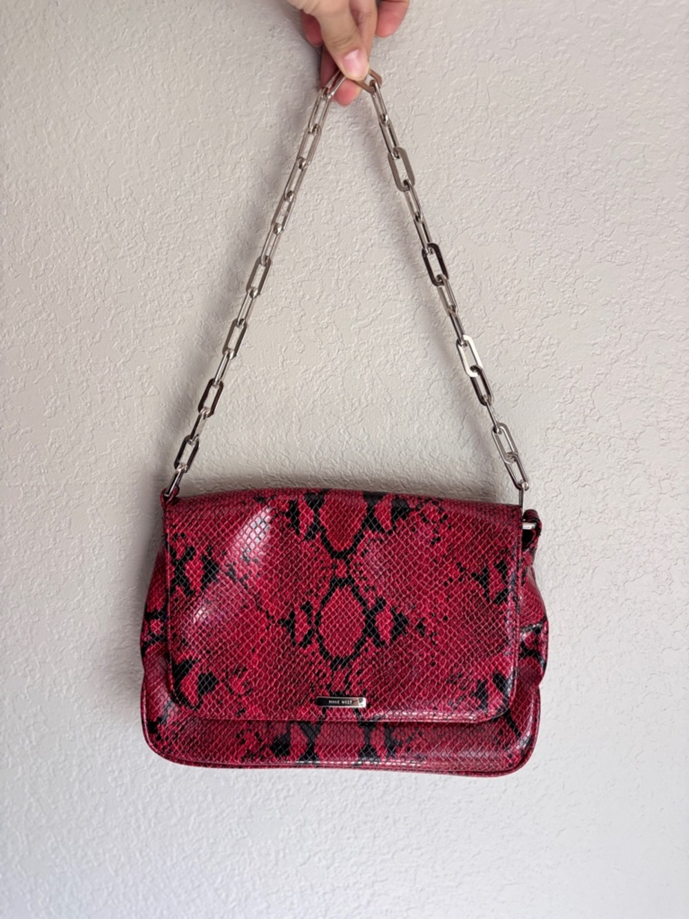 Nine West red and black snake print shoulder bag featuring a silver chain strap